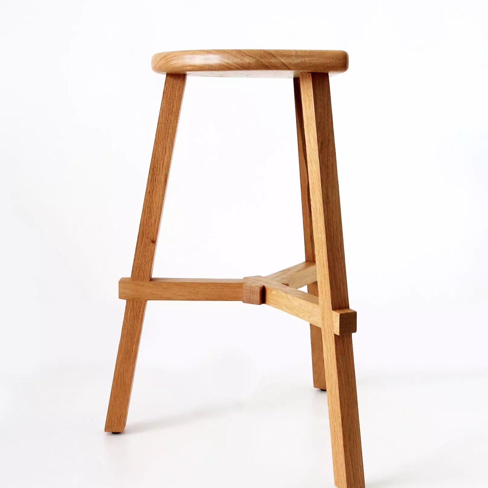 Wooden oak counter stool on a white background