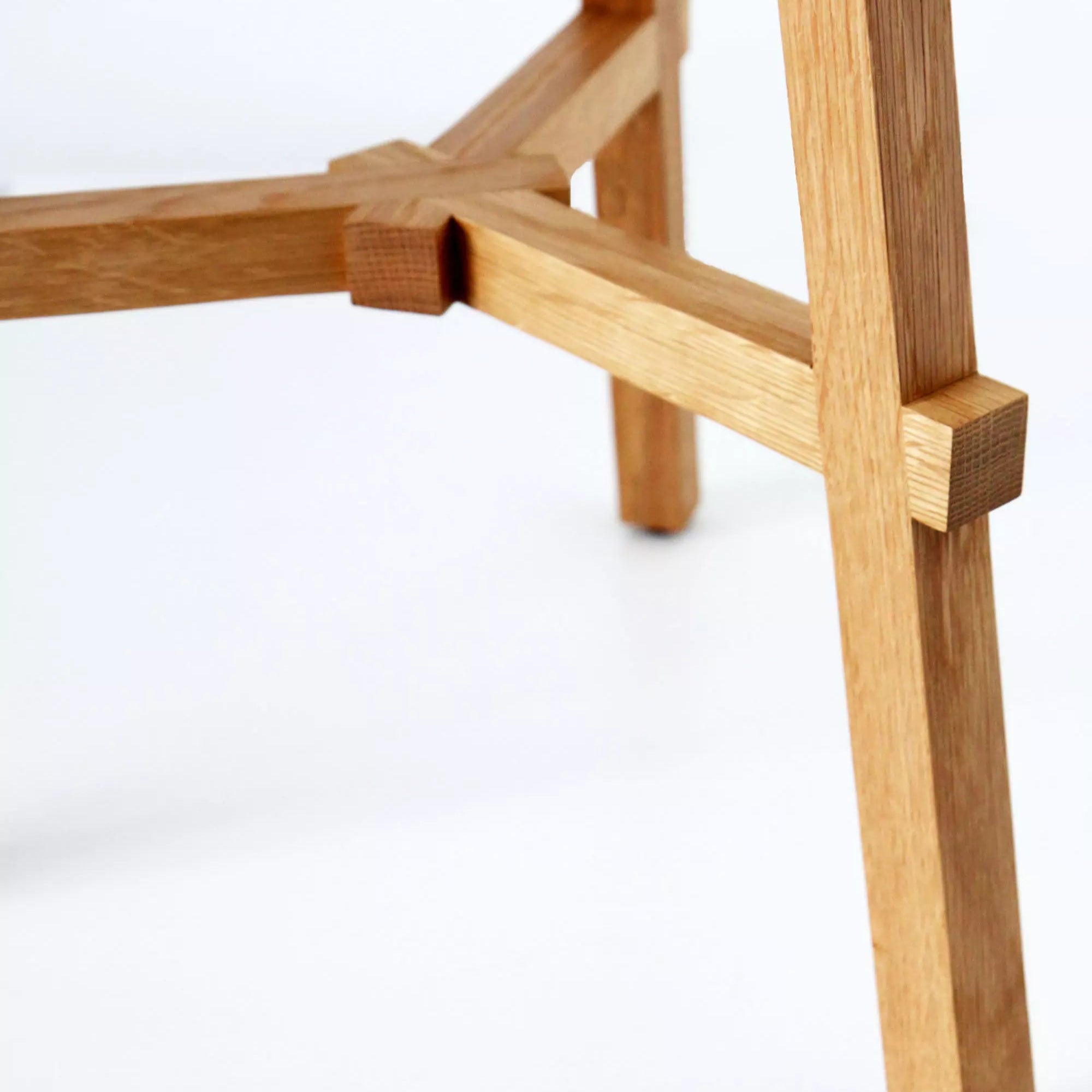 Wooden stool frame on a white background