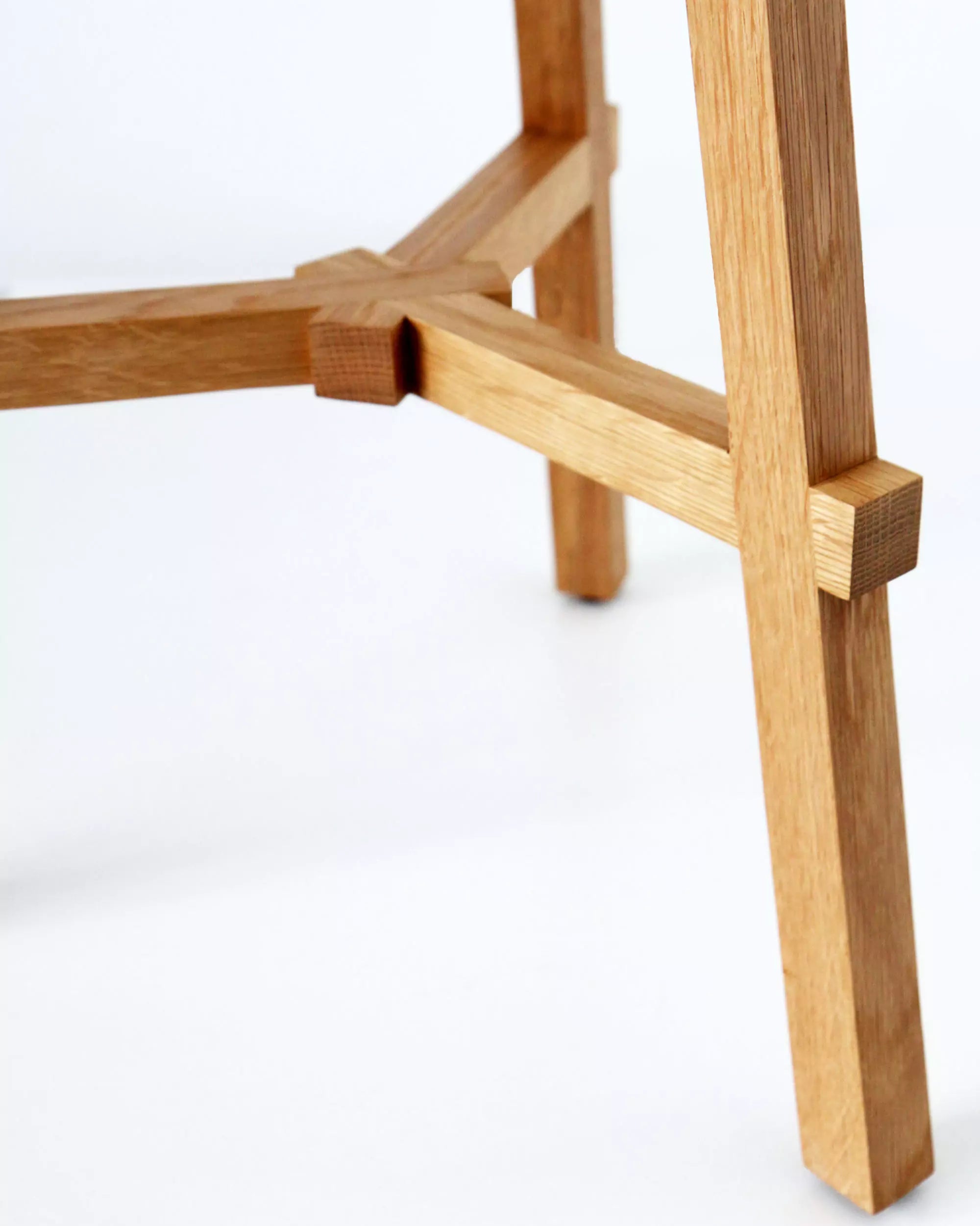 Wooden stool frame on a white background
