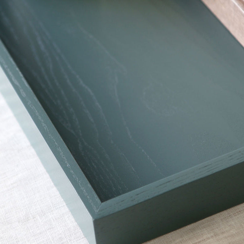 Angled close-up of the inside of the tray, highlighting its clean lines and subtle wood texture.