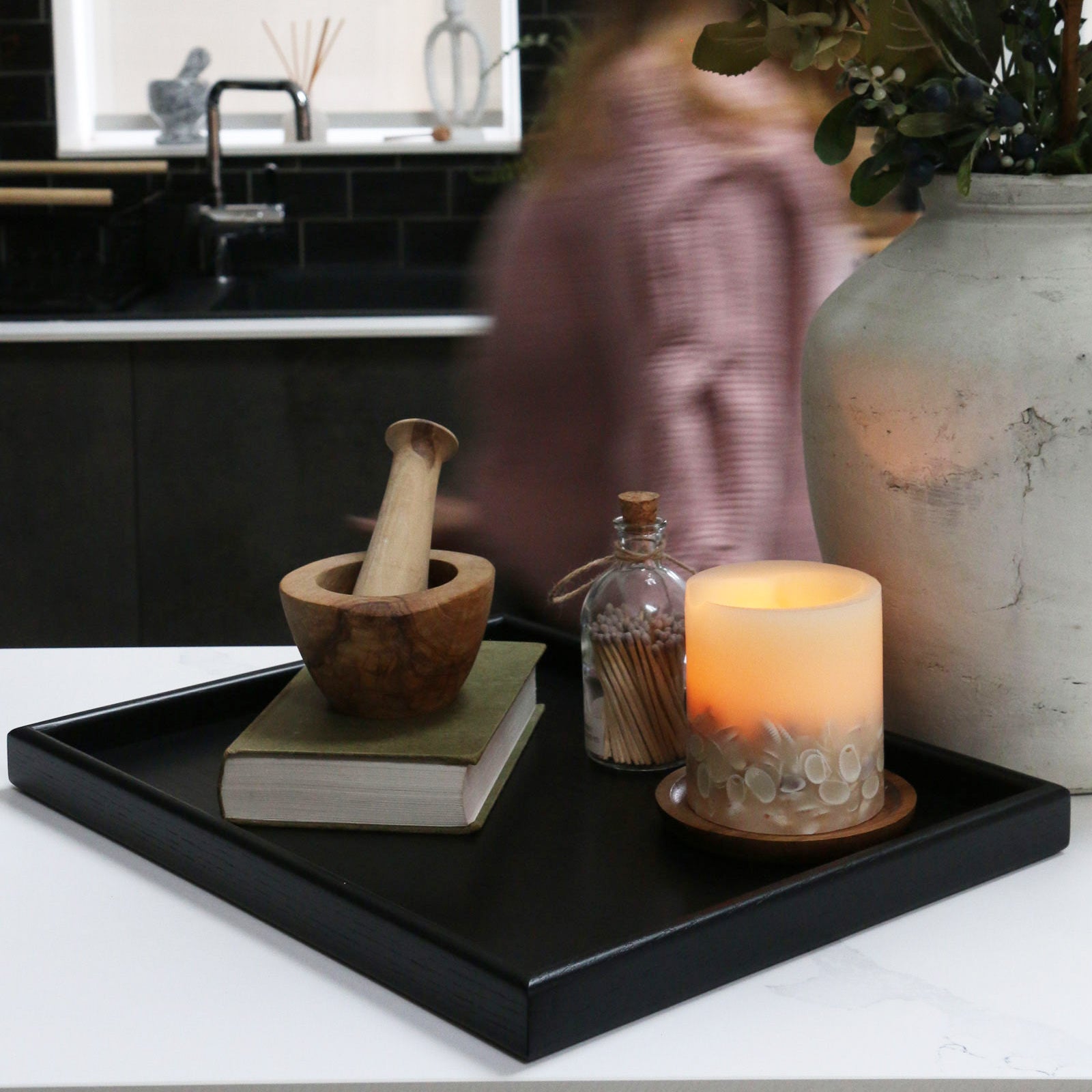 A handcrafted tray adding a functional and stylish touch to a contemporary interior space.