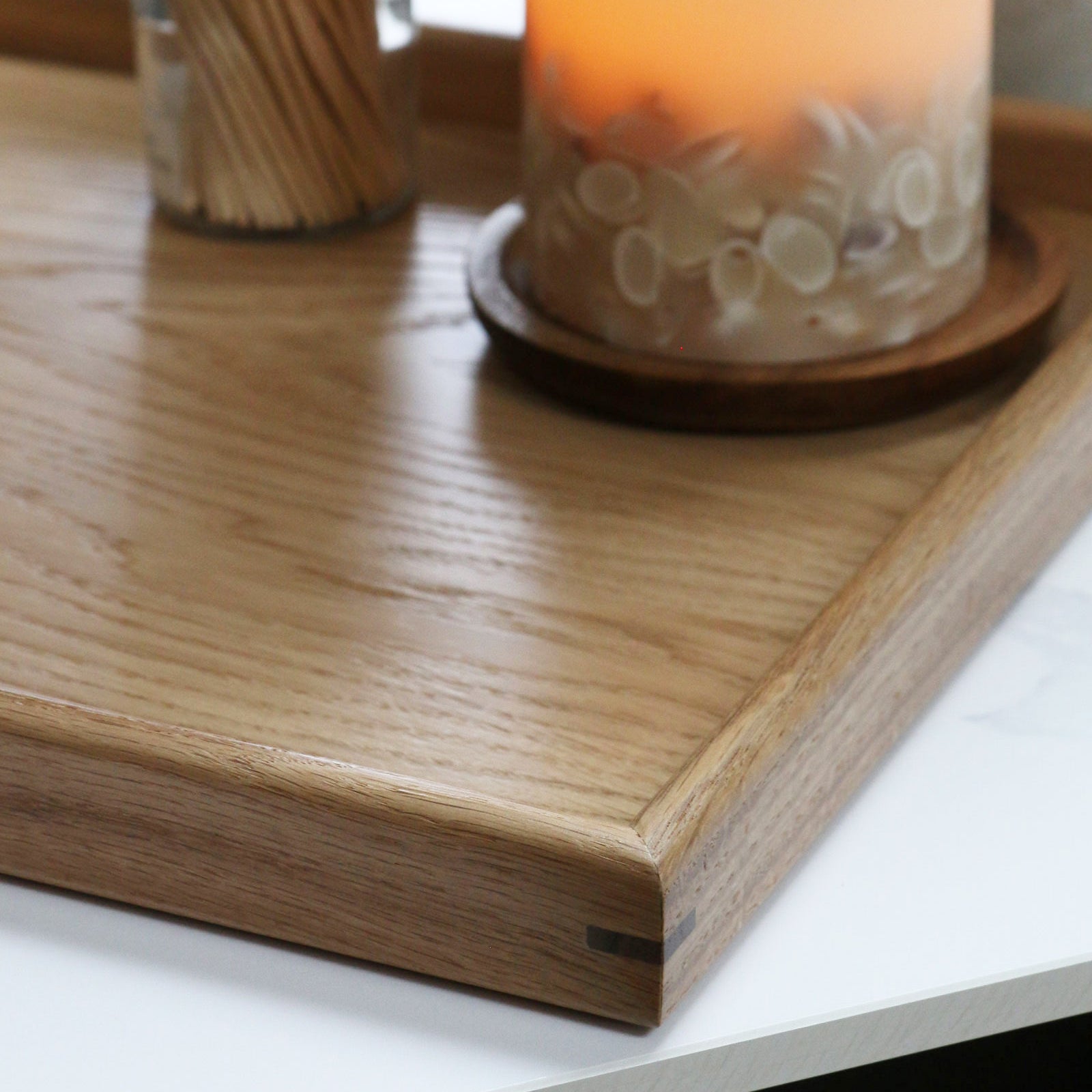 A detailed view of a handcrafted tray, highlighting the wood grain and precise joinery, ideal for a coffee table tray.