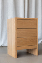 side view of the Gaia solid wood bedside cabinet