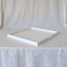 White lacquered serving tray with handles