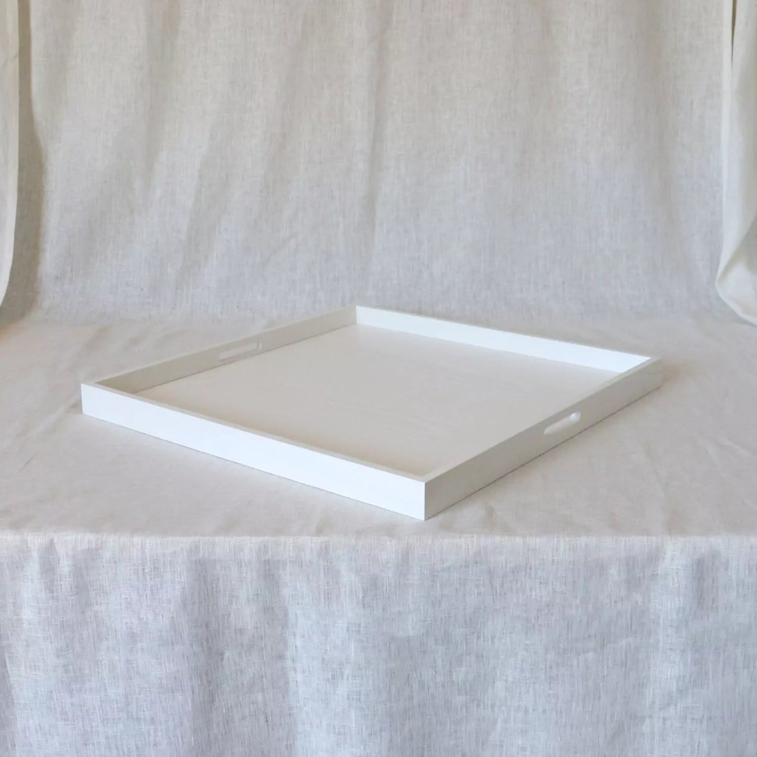 White lacquered serving tray with handles